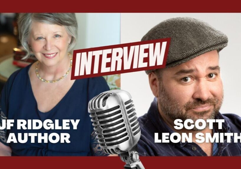 Interview with author and speaker, microphone visible.