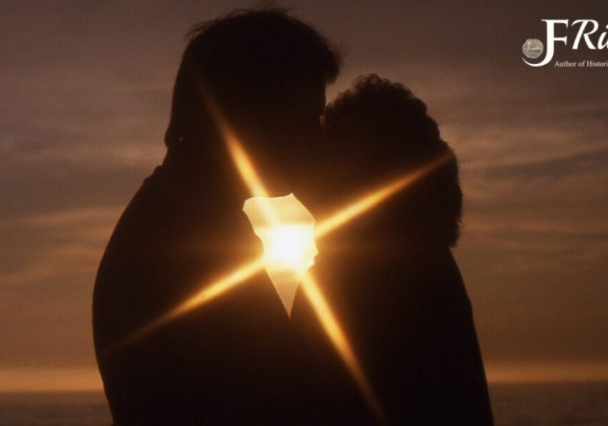 Silhouette couple kissing at sunset beach.